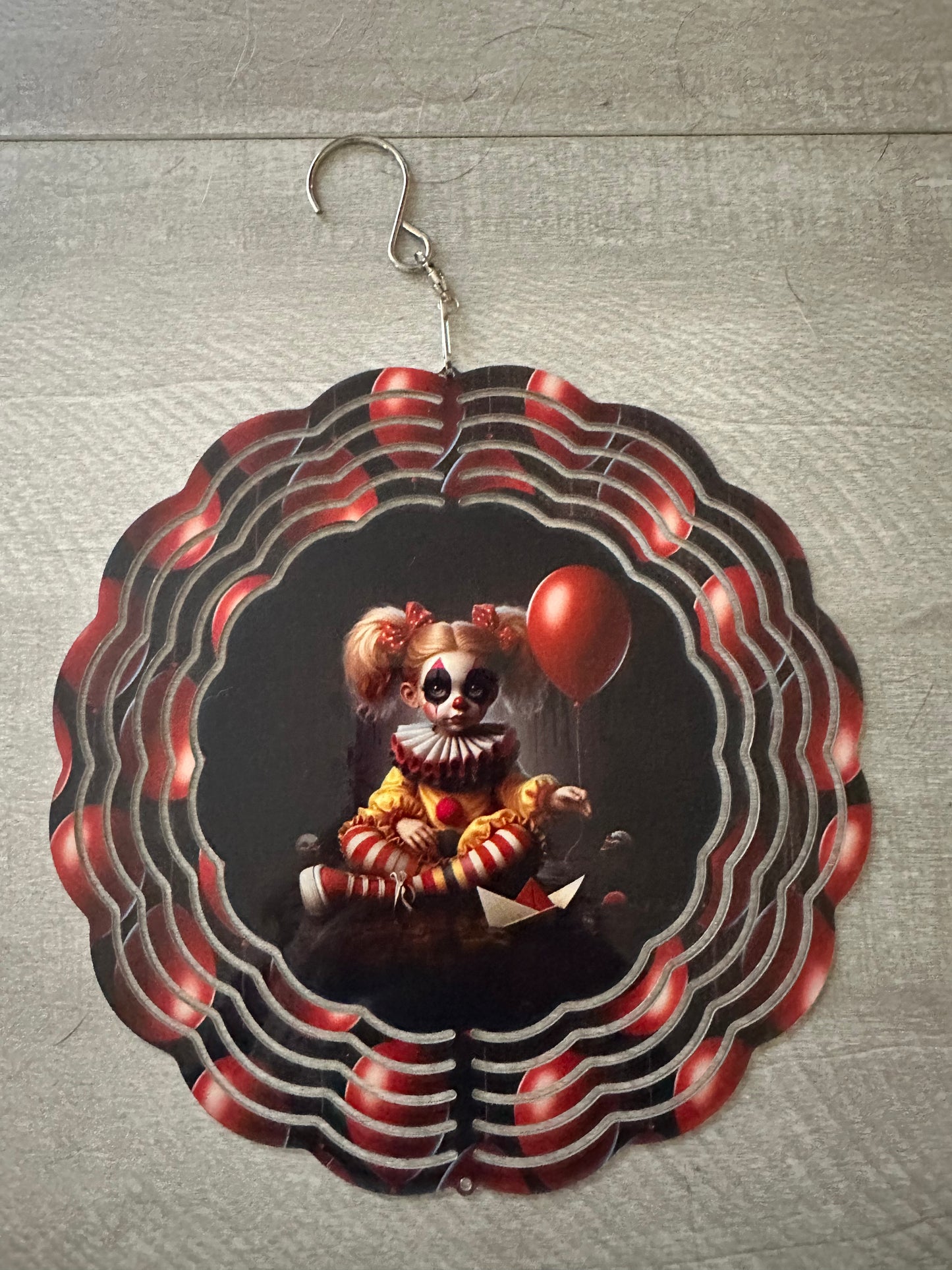 8" wind spinner - IT character with red balloon
